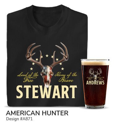 American Hunter - A deer skull adorned with an overlaid American Flag, accompanied by the text Land Of The Free, Home Of The Brave, above Your Name, on black tee and color printed pint glass.